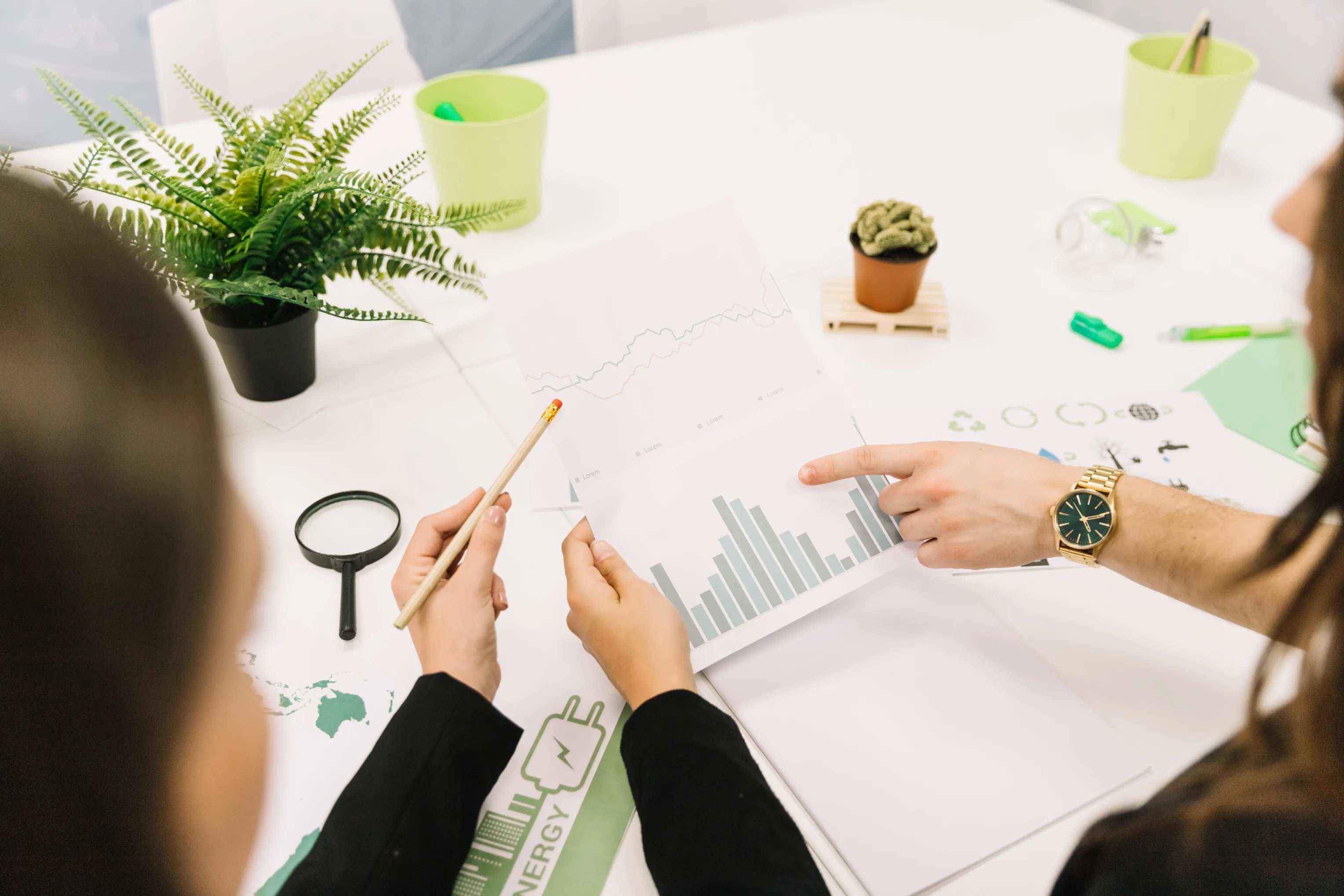 group-businesspeople-analyzing-graph-office (1) (1).jpg